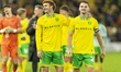 Josh Sargent of Norwich City and Kenny McLean of Norwich City embrace after the Sky Bet Ch...