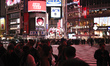 People wait for the green light to walk at the iconic Shibuya Crossing in Tokyo, Japan, on...