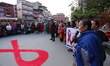 Nepali activists hold a candlelight vigil on the eve of AIDS Day in Kathmandu, Nepal, on N...