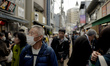 People walk in Yanaka Ginza in Tokyo, Japan, on November 29, 2025. 