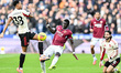 Ryan Gravenberch of Liverpool and El Hadji Malick Diouf of West Ham battle for the ball du...