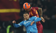 Eljif Elmas of Napoli faces Roma's Gianluca Mancini during the Serie A soccer match betwee...