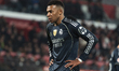 Kylian Mbappe of Real Madrid stands with his hands on his hips and eyes looking down durin...