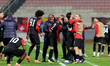 Hamrun Spartans players and technical staff members react in celebration after Semir Smajl...