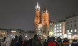 KRAKOW, POLAND – DECEMBER 1:A group of visitors is seen at the Main Market Square in Krak...