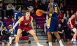 TJ Power (12) of the Penn Quakers plays defense against Rob Dockery (99) of the La Salle E...