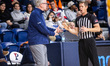 Fran McCaffery, the head coach of the Penn Quakers, discusses a call with the referee duri...