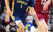 Ashton Walker of the La Salle Explorers drives the ball during an NCAA men's basketball ga...