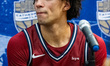 Jay Jones (4) of the Penn Quakers speaks at a press conference after the NCAA men's basket...