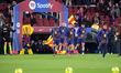 The FC Barcelona players come out onto the field to warm up before the match between FC Ba...