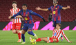 Alejandro Balde plays during the match between FC Barcelona and Club Atletico de Madrid, c...
