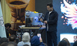 An Iranian coffee specialist teaches people how to make iced coffee during a workshop at I...