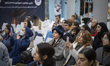 Iranian visitors participate in a workshop during Iran's Coffee, Non-Alcoholic Beverages,...
