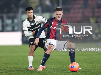 The contrast between Emil Holm of Bologna FC 1909 and Christian Ordonez of Parma Calcio 1913 occurs during the Coppa Italia football match b... by Emanuele Comincini/NurPhoto