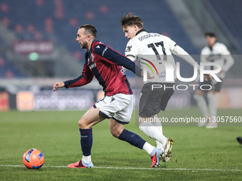 The contrast between Jacob Ondrejka of Parma Calcio 1913 and Federico Bernardeschi of Bologna FC 1909 occurs during the Coppa Italia footbal... by Emanuele Comincini/NurPhoto