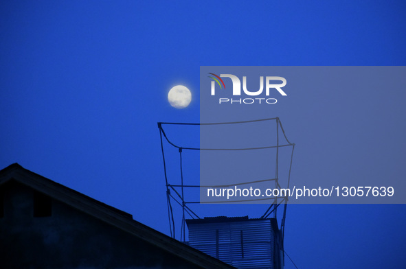 The last supermoon, also known as the cold moon, rises in Srinagar, Kashmir, India, on December 4, 2025.  by Faisal Khan/NurPhoto