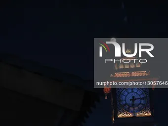 The last supermoon, also known as the cold moon, rises behind the clock tower in Srinagar, Kashmir, India, on December 4, 2025.  by Faisal Khan/NurPhoto
