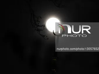 The last supermoon, also known as the cold moon, rises behind the clouds in Srinagar, Kashmir, India, on December 4, 2025.  by Faisal Khan/NurPhoto