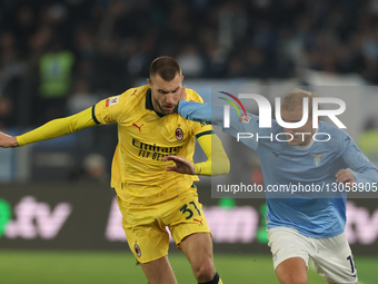 Gustav Isaksen of Lazio and Strahinja Pavlovic of Milan play during the Coppa Italia soccer match, round of 16, between SS Lazio and AC Mila... by Ciro De Luca/NurPhoto