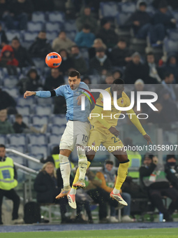 Mattia Zaccagni of Lazio and Fikayo Tomori of Milan play during the Coppa Italia soccer match, round of 16, between SS Lazio and AC Milan at... by Ciro De Luca/NurPhoto