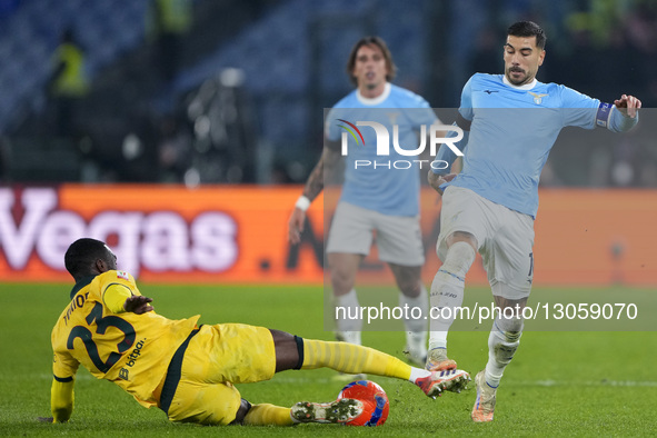 Mattia Zaccagni of S.S. Lazio competes for the ball with Fikayo Tomori of AC Milan during the Coppa Italia round of 16 match between SS Lazi...