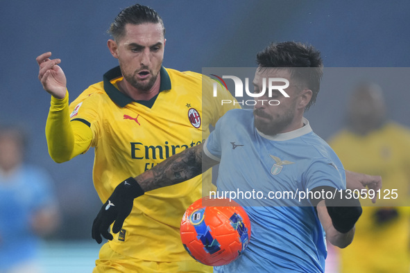 Adrien Rabiot of AC Milan competes for the ball with Mario Gila Fuentes of S.S. Lazio during the Coppa Italia round of 16 match between SS L... by Danilo Di Giovanni/NurPhoto