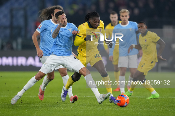 Matias Vecino of S.S. Lazio competes for the ball with Rafael Leao of AC Milan during the Coppa Italia round of 16 match between SS Lazio an... by Danilo Di Giovanni/NurPhoto