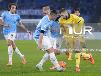 Strahinja Pavlovic of AC Milan competes for the ball with Adam Marusic of S.S. Lazio during the Coppa Italia round of 16 match between SS La... by Danilo Di Giovanni/NurPhoto
