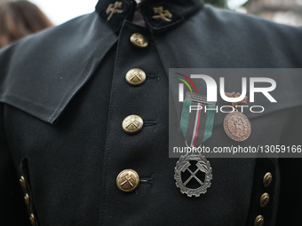 KATOWICE, POLAND – DECEMBER 4:
A member of the mining community carries Zasluzony dla Gornictwa (Meritorious for Mining) and Odznaka za Dług... by Artur Widak/NurPhoto