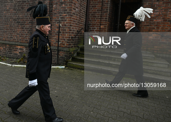 KATOWICE, POLAND – DECEMBER 4:
Members of the mining community leave St. Anne Church after attending the Holy Mass on St. Barbara’s Day, the... by Artur Widak/NurPhoto