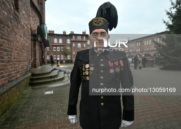 KATOWICE, POLAND – DECEMBER 4:
Members of the mining community and their families leave St. Anne Church after attending the Holy Mass on St.... by Artur Widak/NurPhoto