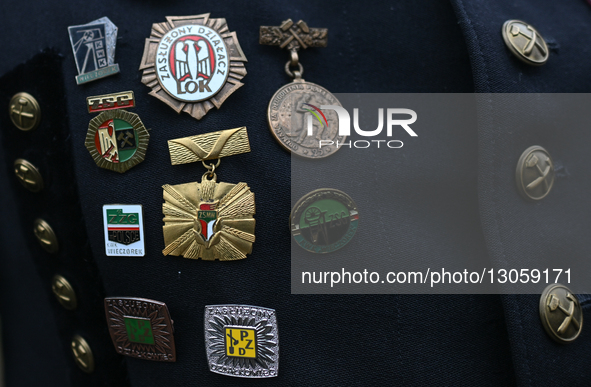 KATOWICE, POLAND – DECEMBER 4:
A member of the mining community carries decorations from the former PRL (People’s Republic of Poland), as he... by Artur Widak/NurPhoto