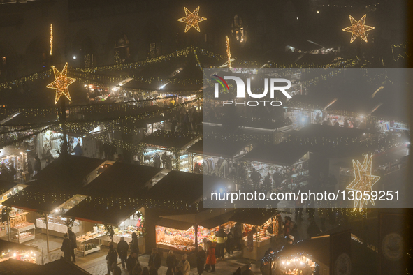 KRAKOW, POLAND – DECEMBER 4:
A general view of the Christmas Market in Krakow’s UNESCO-listed Main Market Square, featuring festive stalls a... by Artur Widak/NurPhoto