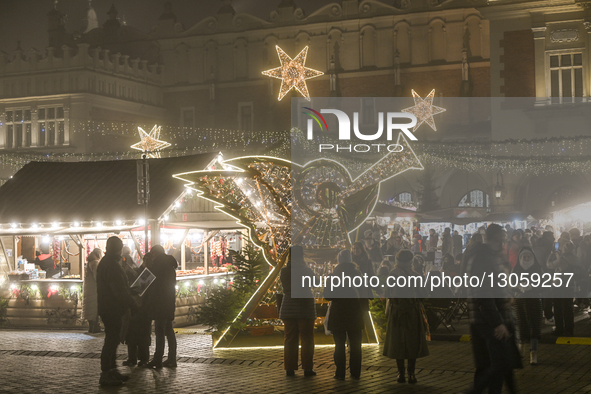 KRAKOW, POLAND – DECEMBER 4:
A view of the Christmas Market in Krakow’s UNESCO-listed Main Market Square, featuring festive stalls and holid... by Artur Widak/NurPhoto