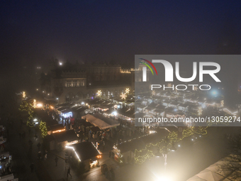 KRAKOW, POLAND – DECEMBER 4:
A general view of the Christmas Market in Krakow’s UNESCO-listed Main Market Square, featuring festive stalls a... by Artur Widak/NurPhoto