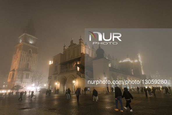 KRAKOW, POLAND – DECEMBER 4:
A view of Krakow’s Main Market Square and the Cloth Hall amid dense afternoon fog, in Krakow, Poland, on Decemb... by Artur Widak/NurPhoto