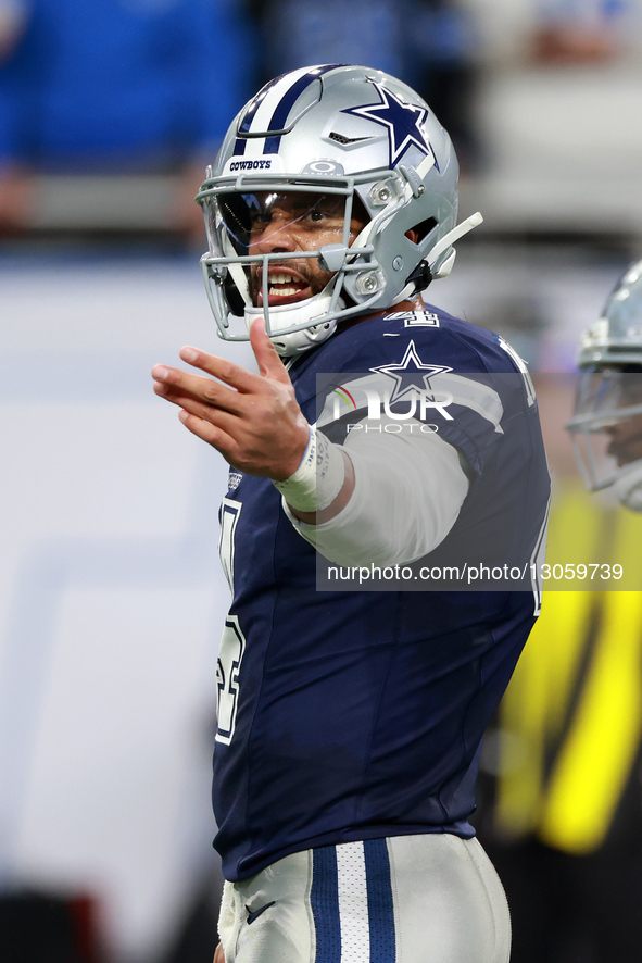 DETROIT,MICHIGAN-December4: Quarterback Dak Prescott (4) of the Dallas Cowboys gestures befoer a play during an NFL football game between th... by Amy Lemus/NurPhoto