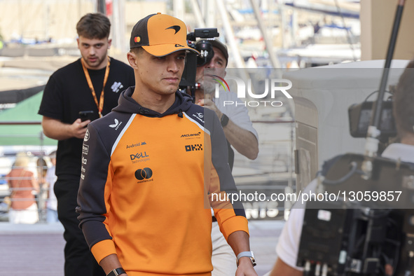 Lando Norris of the United Kingdom in the paddock walking before the press conference, the F1 racing driver of McLaren Formula One team in Y... by Nicolas Economou/NurPhoto