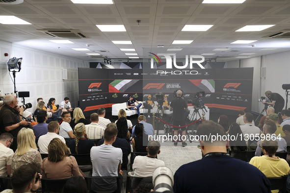 Max Verstappen of Red Bull Racing (L), Lando Norris (M) and Oscar Piastri (R) of McLaren Formula 1 team during a press conference event in Y... by Nicolas Economou/NurPhoto