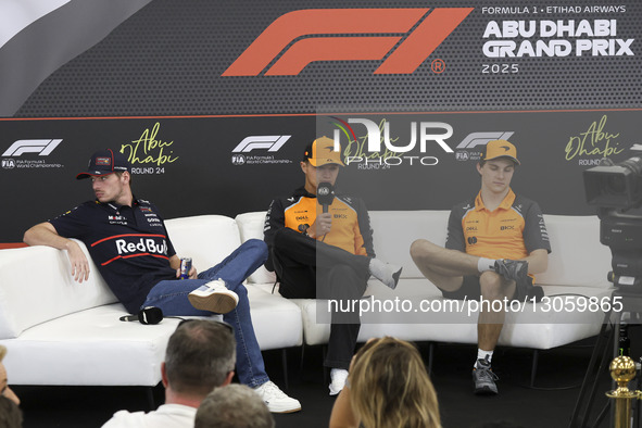 Max Verstappen of Red Bull Racing (L), Lando Norris (M) and Oscar Piastri (R) of McLaren Formula 1 team during a press conference event in Y... by Nicolas Economou/NurPhoto