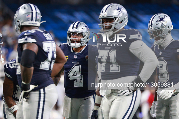 DETROIT,MICHIGAN-DECEMBER 4: Dallas Cowboys quarterback Dak Prescott #4 talks to players during the first half of an NFL football game betwe... by Jorge Lemus/NurPhoto