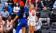 Skye Belker (10) of the Princeton Tigers attempts a three-point field goal during an NCAA...