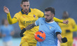 Adrien Rabiot of AC Milan competes for the ball with Mario Gila Fuentes of S.S. Lazio duri...