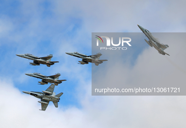 Five McDonnell Douglas EF-18 Hornets of the Spanish Air Force fly in formation over the Torrejon de Ardoz military base in Madrid, Spain, on... by Urbanandsport/NurPhoto