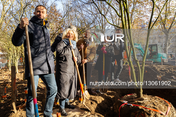 The Mayor of Paris, Anne Hidalgo, is seen during the launch of the new tree planting season in the new urban forest at Place du Colonel Fabi... by Telmo Pinto/NurPhoto