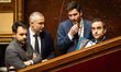 The French Prime Minister Sebastien Lecornu stands next to his parliamentary advisor Guill...