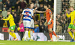 Jimmy Dunne of Queens Park Rangers reacts to Vladan Kovacevic of Norwich City during the S...