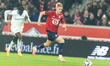 Timothy Weath of Olympique de Marseille (L) and Hakon Haraldsson of Lille LOSC (R) partici...