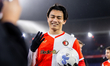 Feyenoord player Ayase Ueda holds the ball and celebrates the victory after the match Feye...
