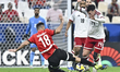 Nicolas Gimenez of the United Arab Emirates and Marwan Hamdy of Egypt are in action during...